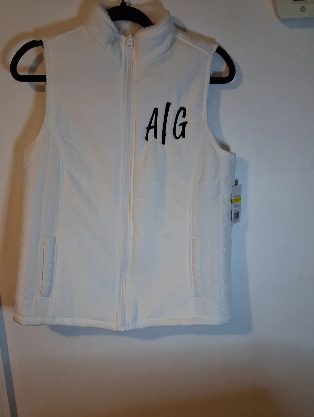 Kim Rogers White Fleece Vest with Black Chest Logo